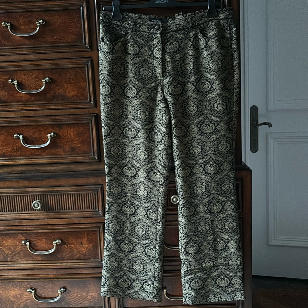 Patterned black and pale yellow pants.